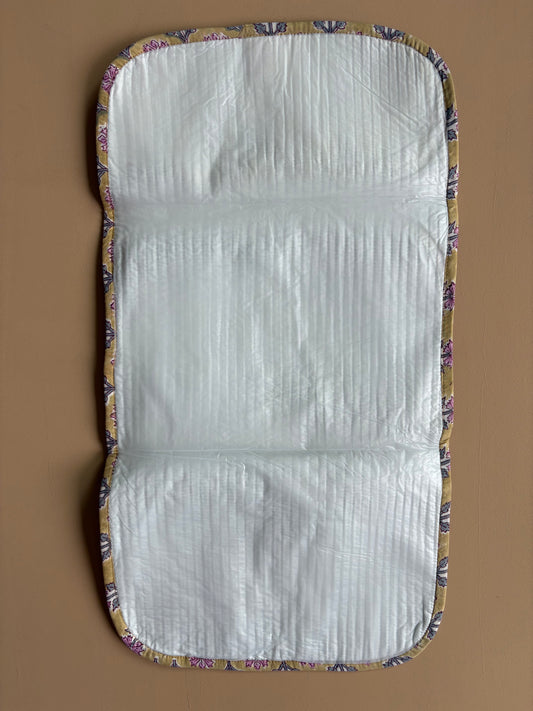 Changing mat - yellow flower