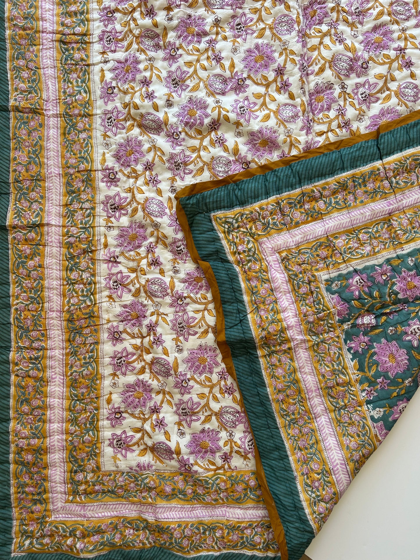 Padded blanket - green-blue/ochre